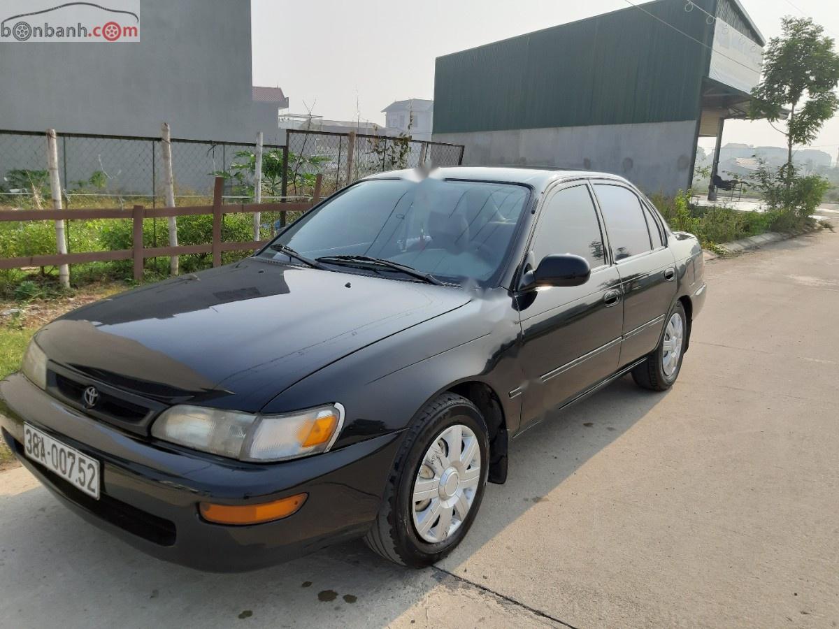 Toyota Corolla 1996 - Cần bán gấp Toyota Corolla sản xuất năm 1996, màu đen, nhập khẩu chính hãng