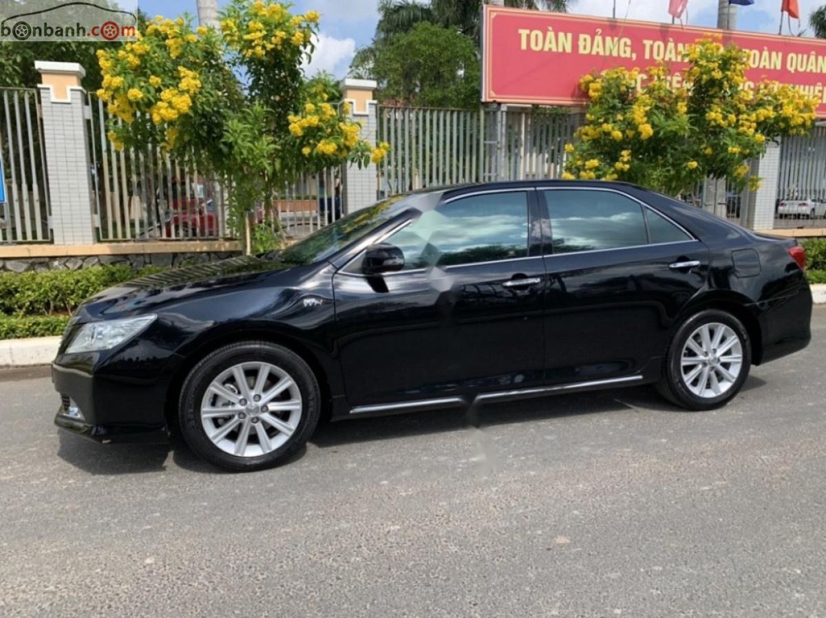 Toyota Camry   2013 - Bán Toyota Camry sản xuất 2013, màu đen xe còn mới lắm