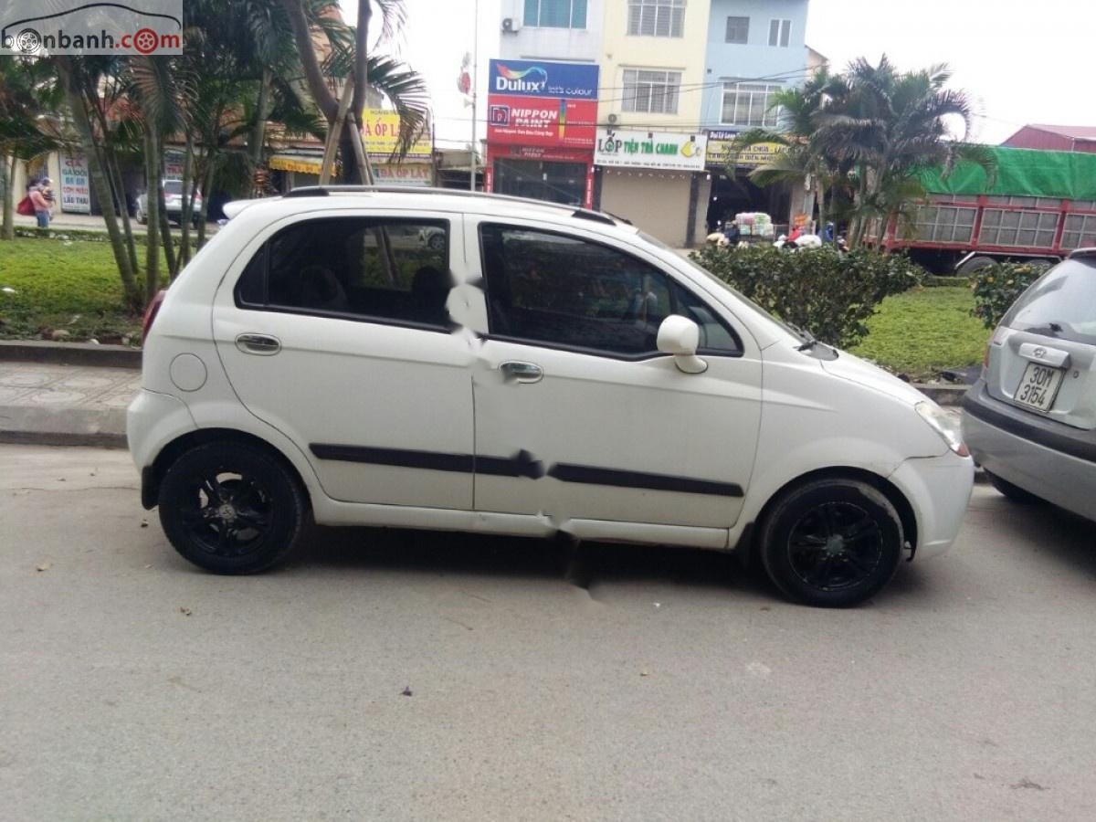 Chevrolet Spark  AT 2009 - Cần bán gấp Chevrolet Spark AT năm sản xuất 2009, màu trắng như mới, giá 155tr