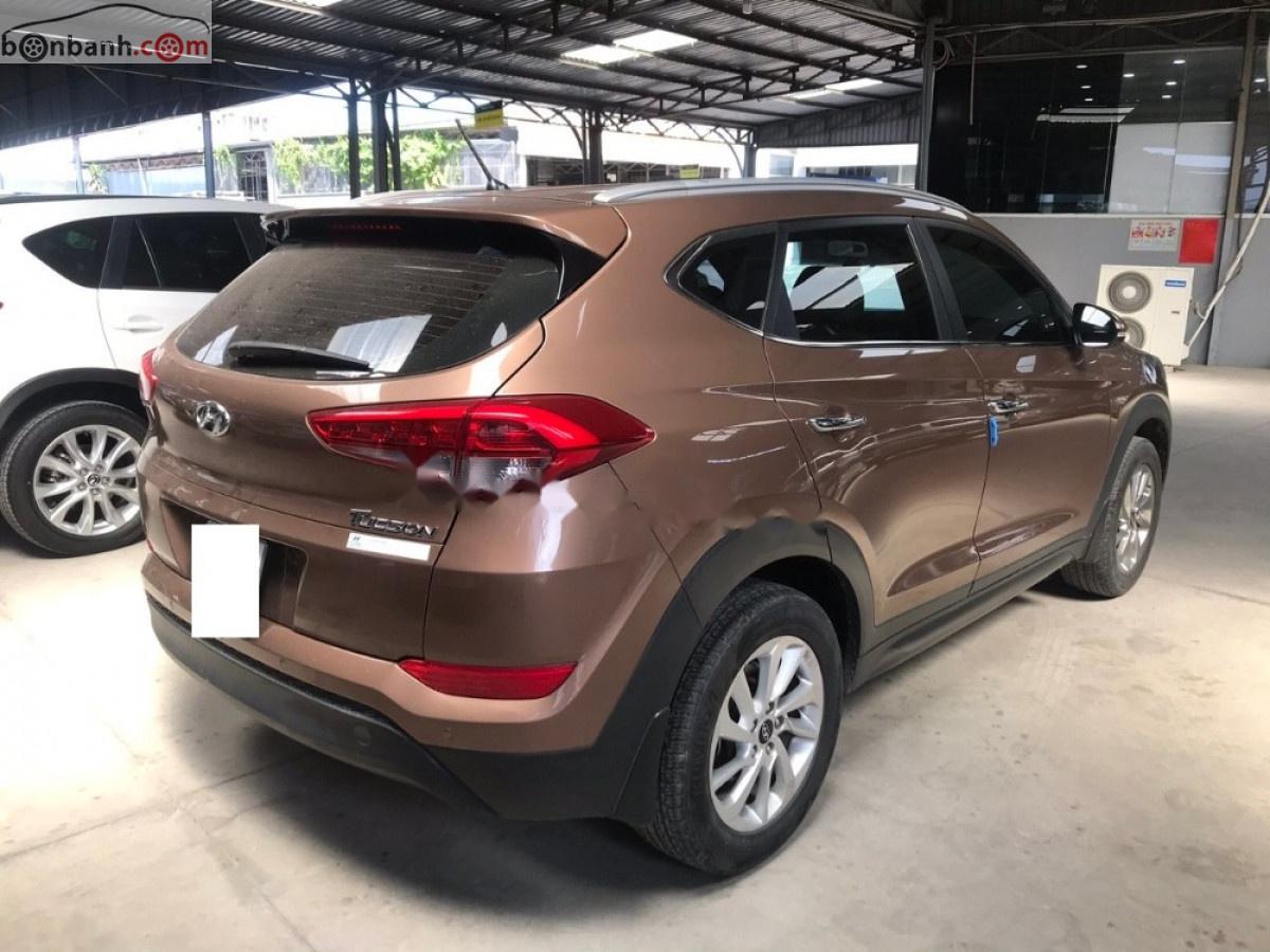 Hyundai Tucson 2.0 AT 2016 - Bán Hyundai Tucson 2.0 AT đời 2016, màu nâu, xe nhập