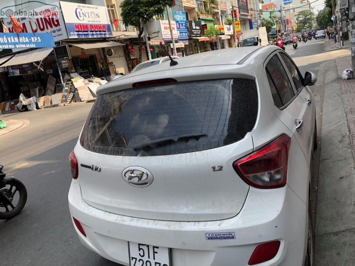 Hyundai Grand i10 2016 - Cần bán lại xe Hyundai Grand i10 1.2 MT năm sản xuất 2016, màu trắng, nhập khẩu xe gia đình, 310tr