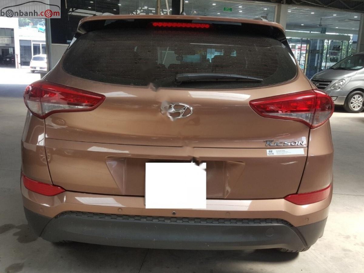 Hyundai Tucson 2.0 AT 2016 - Bán Hyundai Tucson 2.0 AT đời 2016, màu nâu, xe nhập