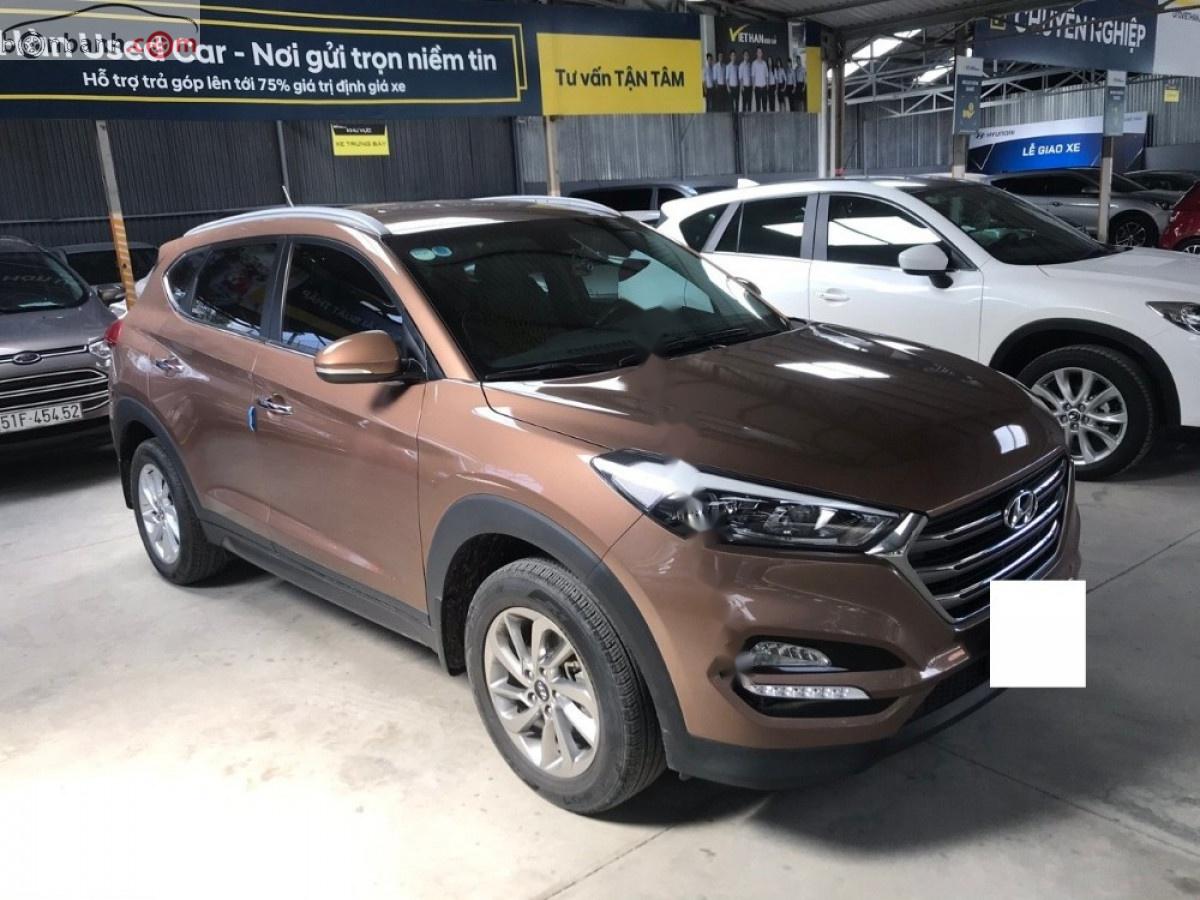 Hyundai Tucson 2.0 AT 2016 - Bán Hyundai Tucson 2.0 AT đời 2016, màu nâu, xe nhập