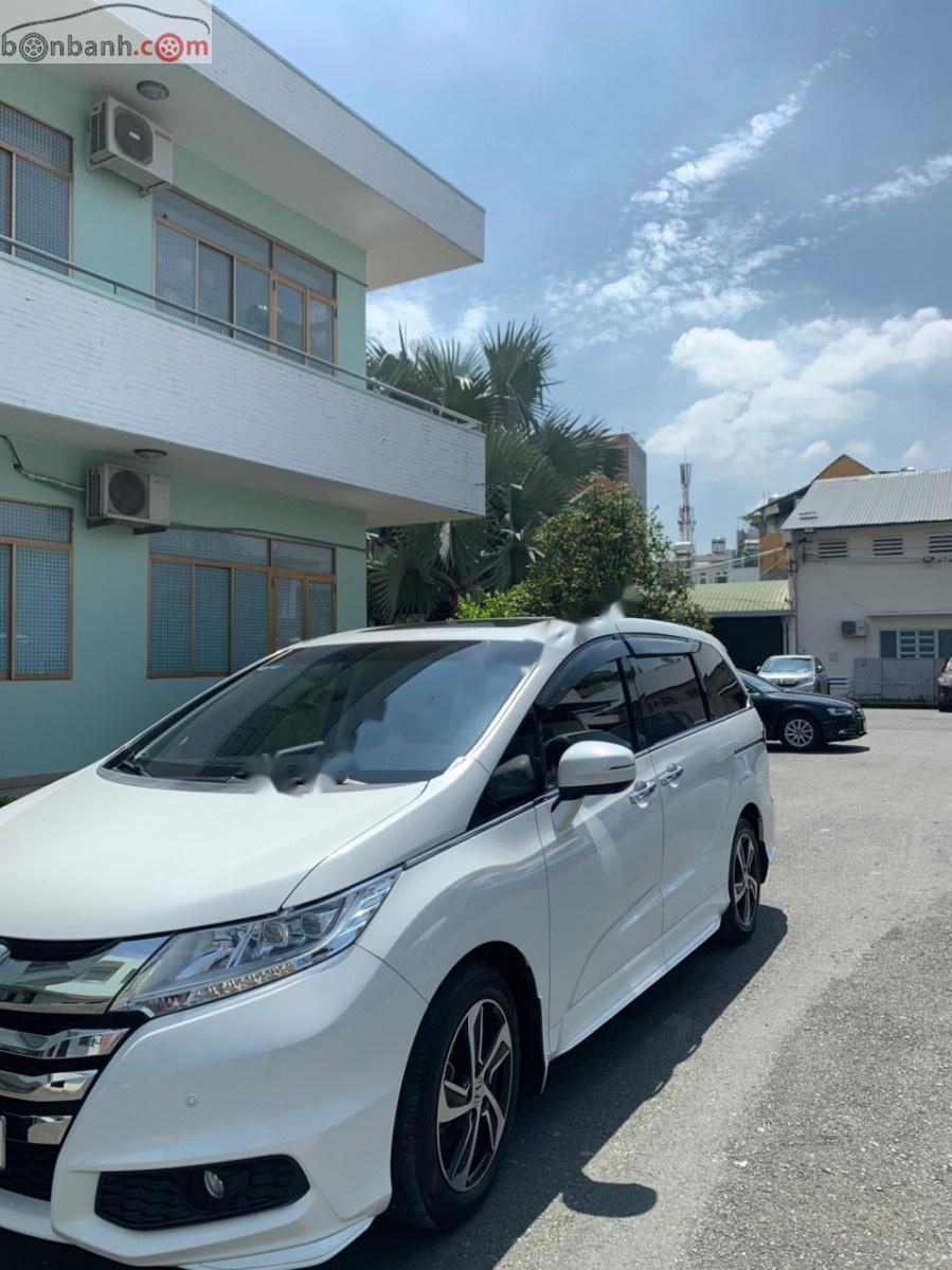 Honda Odyssey 2.4 AT 2015 - Bán Honda Odyssey 2.4 AT đời 2015, màu trắng, xe nhập số tự động