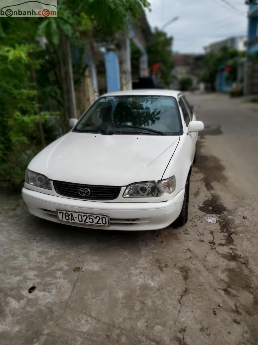 Toyota Corolla 2001 - Bán Toyota Corolla Se dan đời 2001, màu trắng, giá 99tr xe còn mới nguyên