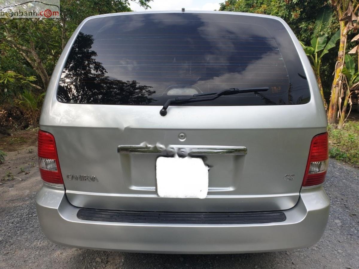 Kia Carnival GS 2.5AT 2009 - Bán Kia Carnival GS 2.5AT năm 2009, màu bạc xe gia đình giá cạnh tranh