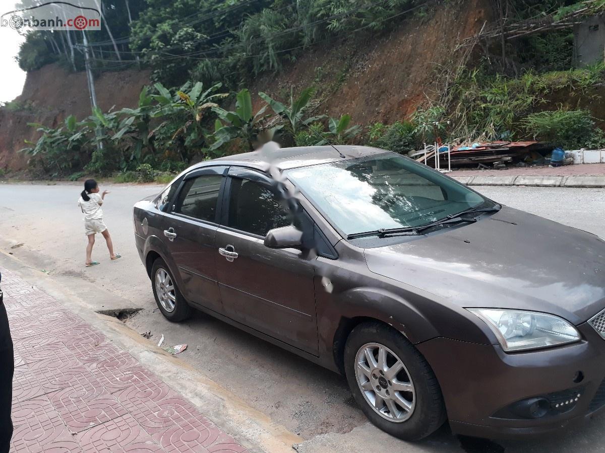 Ford Focus 2.0 AT 2005 - Bán xe Ford Focus 2.0 AT sản xuất năm 2005, màu nâu