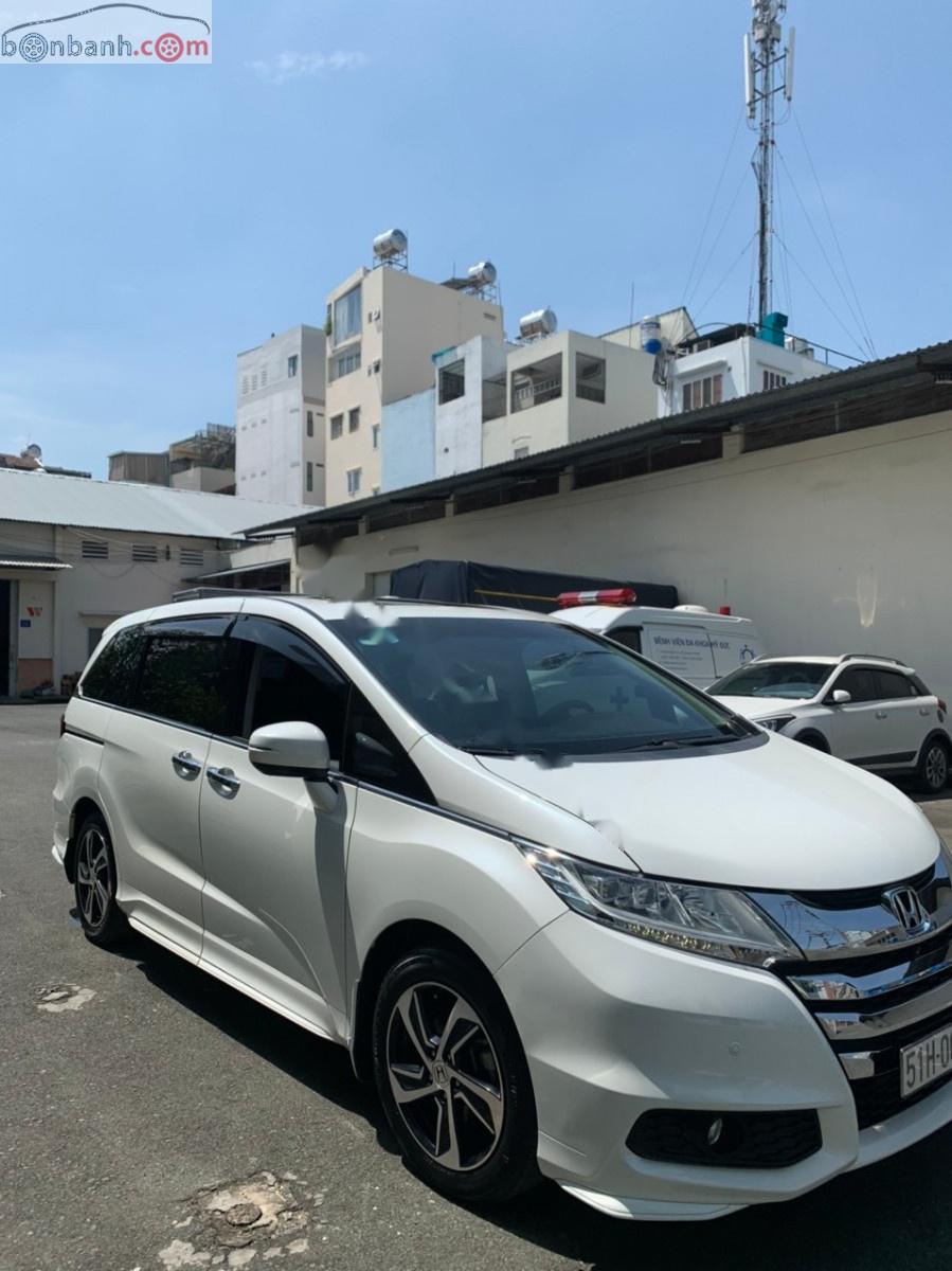 Honda Odyssey 2.4 AT 2015 - Bán Honda Odyssey 2.4 AT đời 2015, màu trắng, xe nhập số tự động