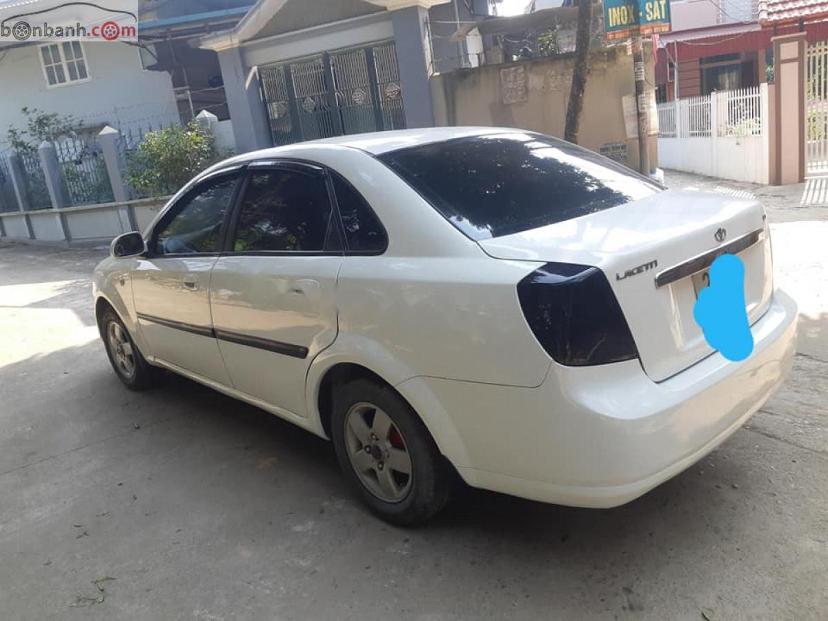 Daewoo Lacetti EX 1.6 MT 2004 - Cần bán gấp Daewoo Lacetti EX 1.6 MT năm 2004, màu trắng