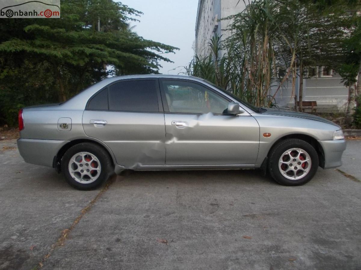 Mitsubishi Lancer 1.6G 2002 - Cần bán xe Mitsubishi Lancer 1.6G đời 2002, màu xám, 135 triệu