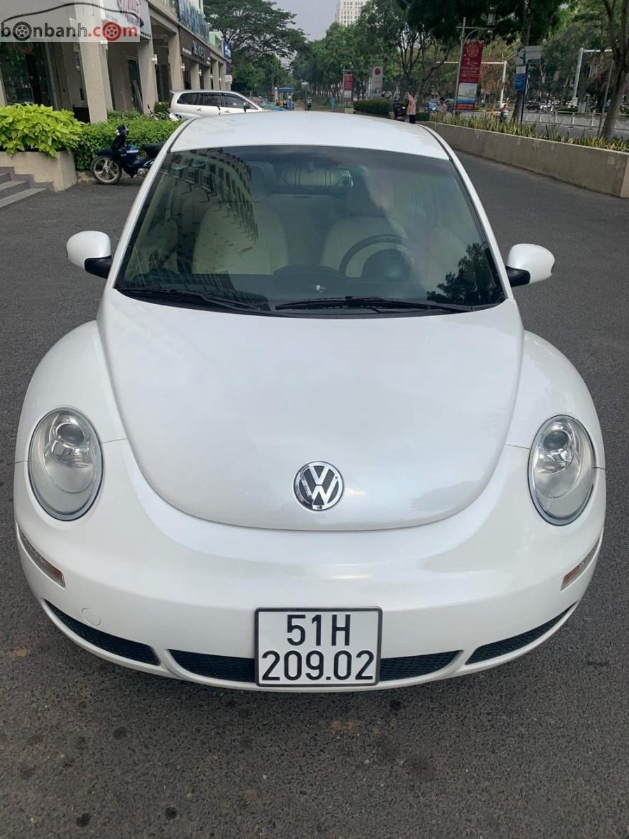 Volkswagen Beetle   2010 - Bán Volkswagen Beetle 1.6AT sản xuất năm 2010, màu trắng, nhập khẩu  