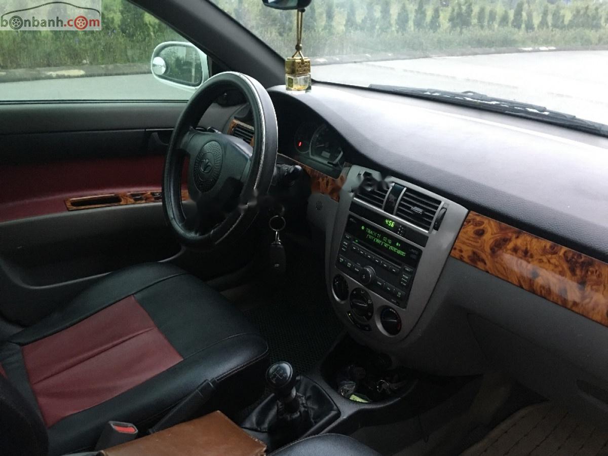 Daewoo Lacetti EX 1.6 MT 2005 - Cần bán xe Daewoo Lacetti đời 2005, màu trắng, số sàn