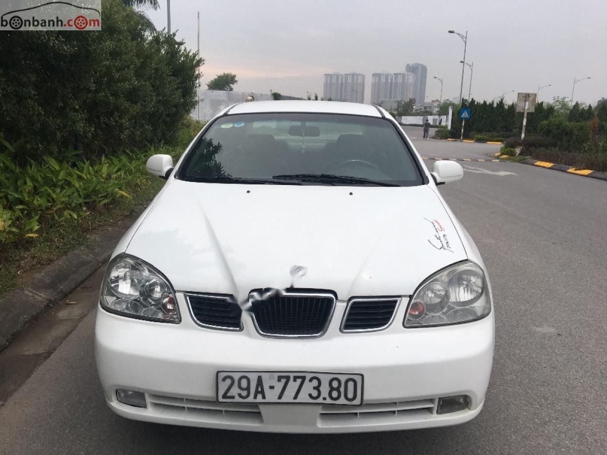 Daewoo Lacetti EX 1.6 MT 2005 - Cần bán xe Daewoo Lacetti đời 2005, màu trắng, số sàn