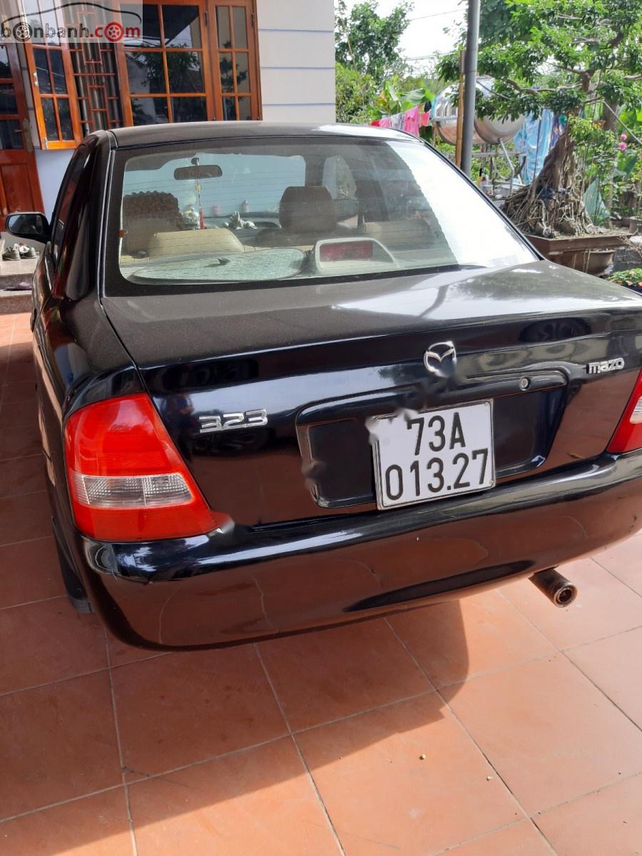 Mazda 323 2003 - Bán Mazda 323 đời 2003, màu đen chính chủ, giá tốt