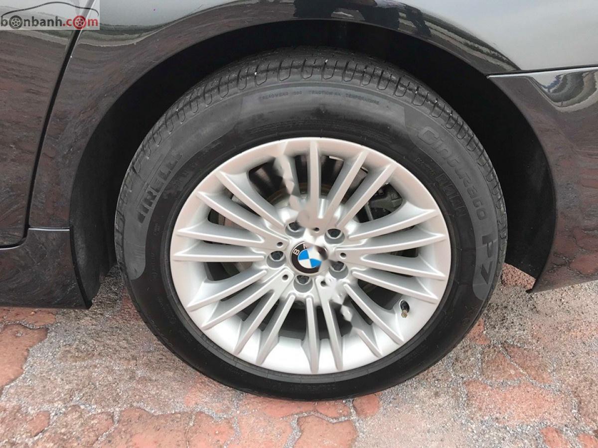 BMW 5 Series   2014 - Cần bán xe BMW 520i đời 2014, màu đen, nhập khẩu 