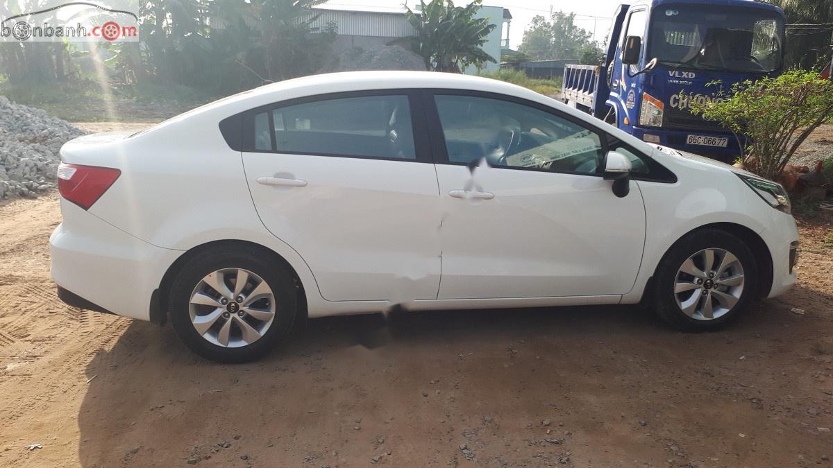 Kia Rio 1.4 AT 2015 - Cần bán xe Kia Rio 1.4 AT 2015, màu trắng, nhập khẩu nguyên chiếc, giá 460tr