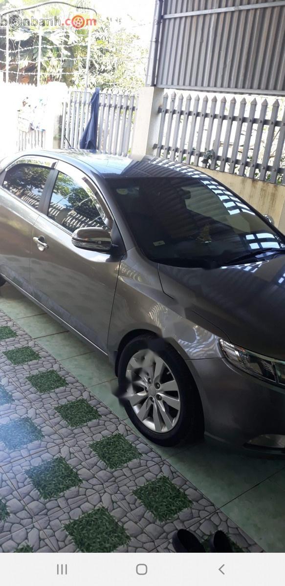 Kia Forte  MT 2010 - Cần bán gấp Kia Forte MT năm sản xuất 2010, màu xám, giá 295tr