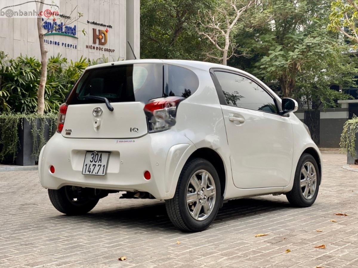 Toyota IQ 1.0 AT 2010 - Cần bán gấp Toyota IQ 1.0 AT sản xuất 2010, màu trắng, xe nhập, giá chỉ 609 triệu