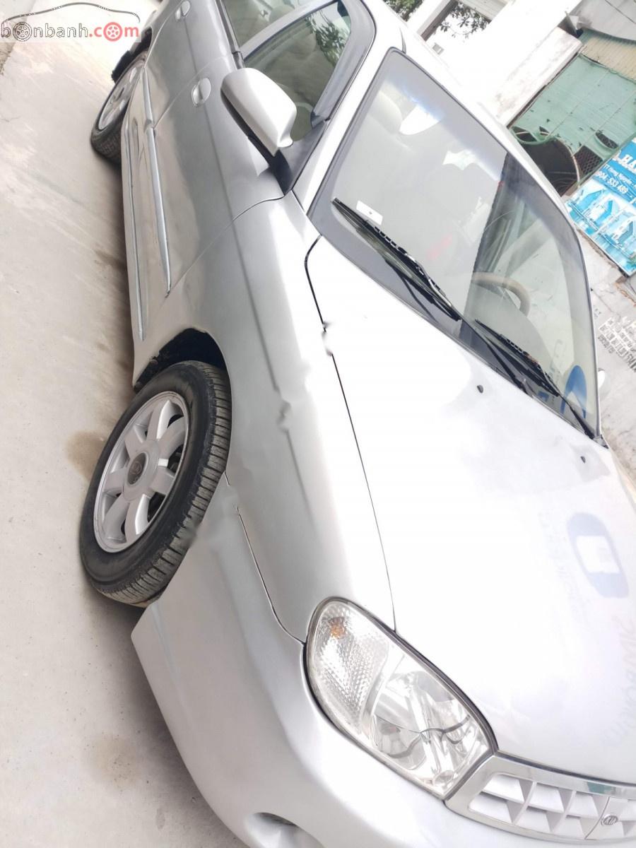 Kia Spectra 1.6 MT 2005 - Bán Kia Spectra 1.6 MT sản xuất 2005, màu bạc, xe nhập, giá 100tr