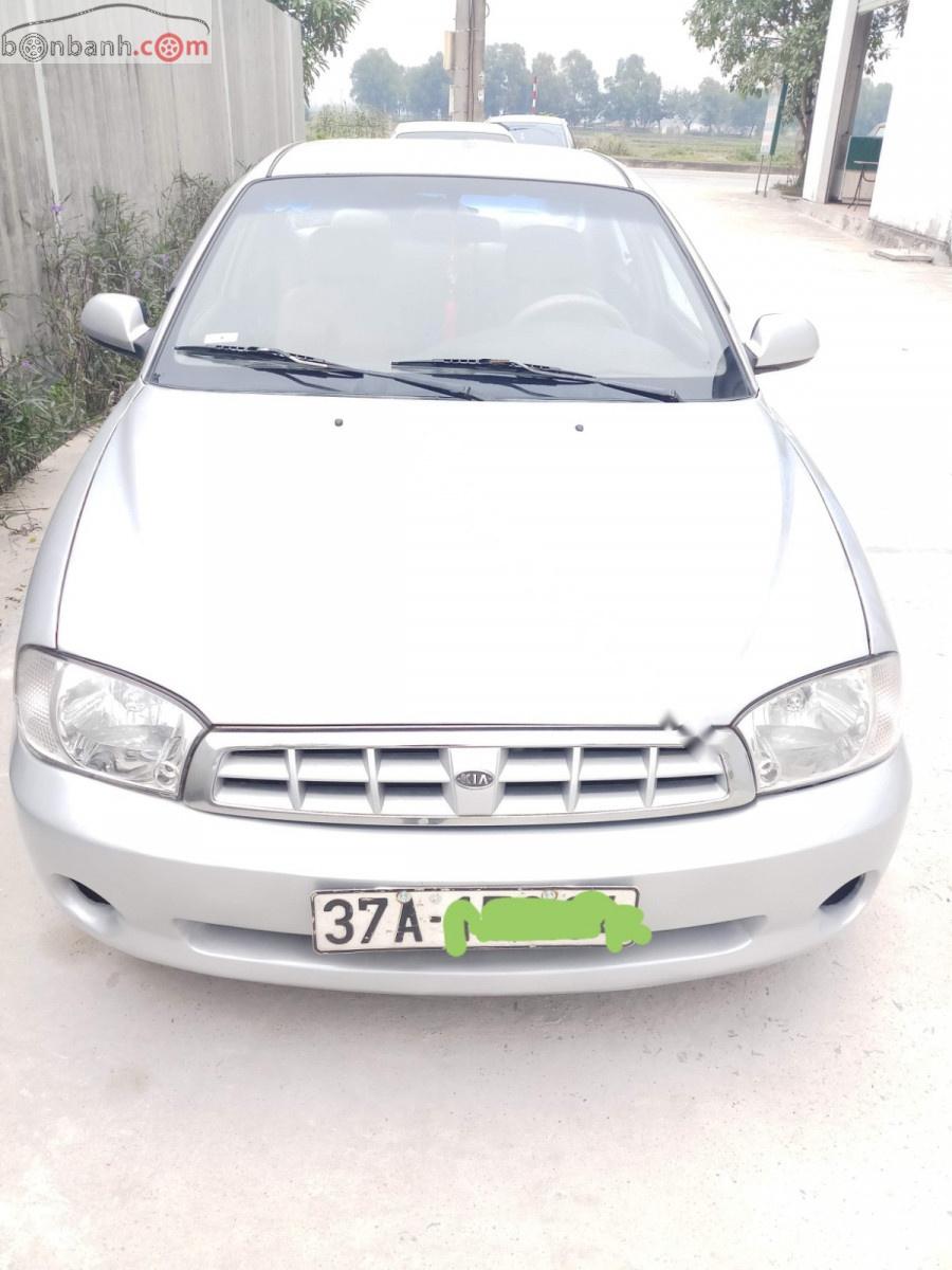 Kia Spectra 1.6 MT 2005 - Bán Kia Spectra 1.6 MT sản xuất 2005, màu bạc, xe nhập, giá 100tr