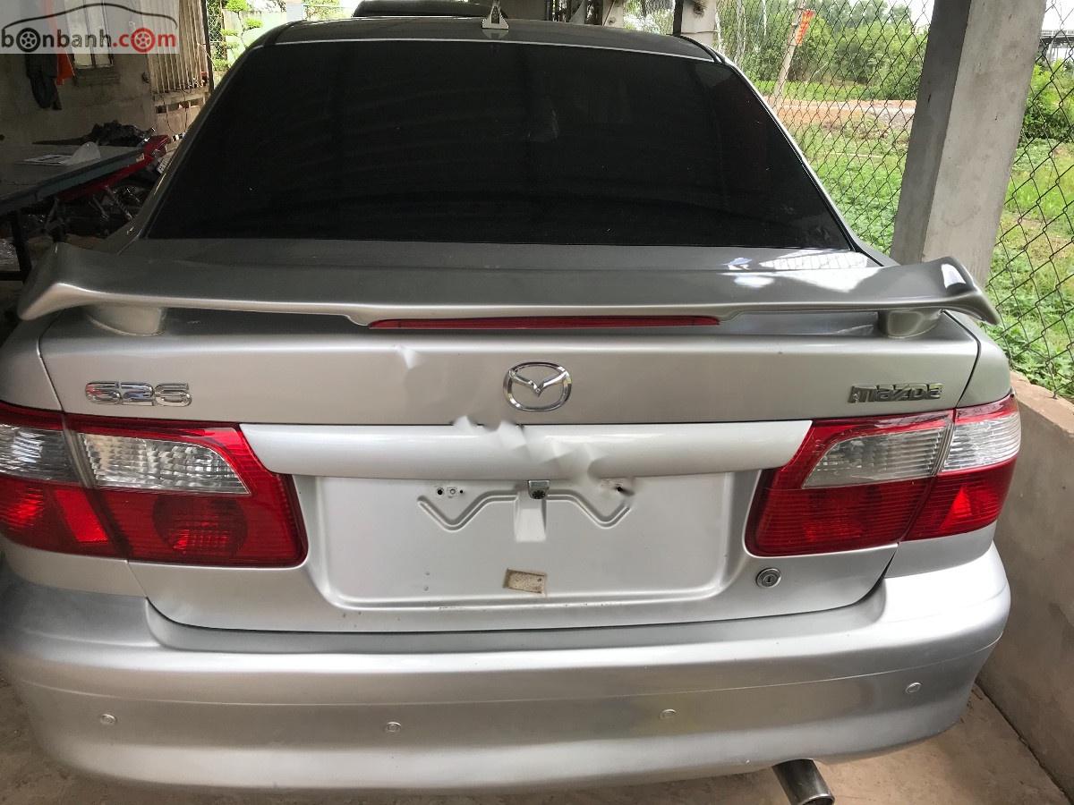 Mazda 626 2003 - Cần bán Mazda 626 đời 2003, màu bạc, xe nhập chính hãng