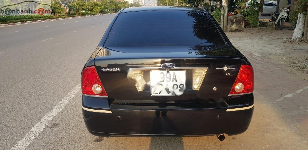 Ford Laser 2003 - Cần bán Ford Laser đời 2003, màu đen, giá chỉ 148 triệu