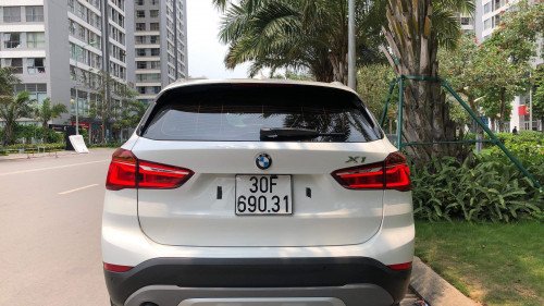 BMW X1 2018 - Bán xe BMW X1 năm 2018, màu trắng còn mới