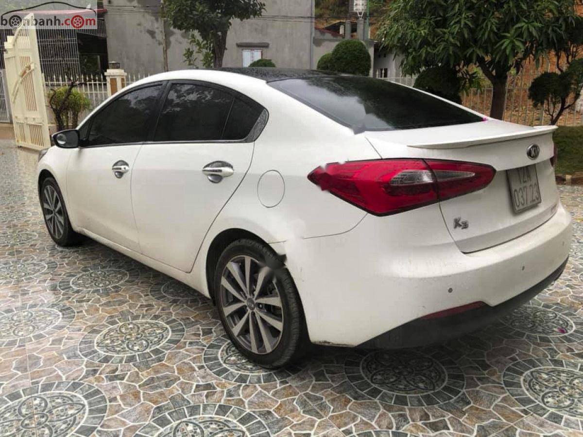 Kia K3 2014 - Cần bán gấp Kia K3 1.6 AT sản xuất 2014, màu trắng