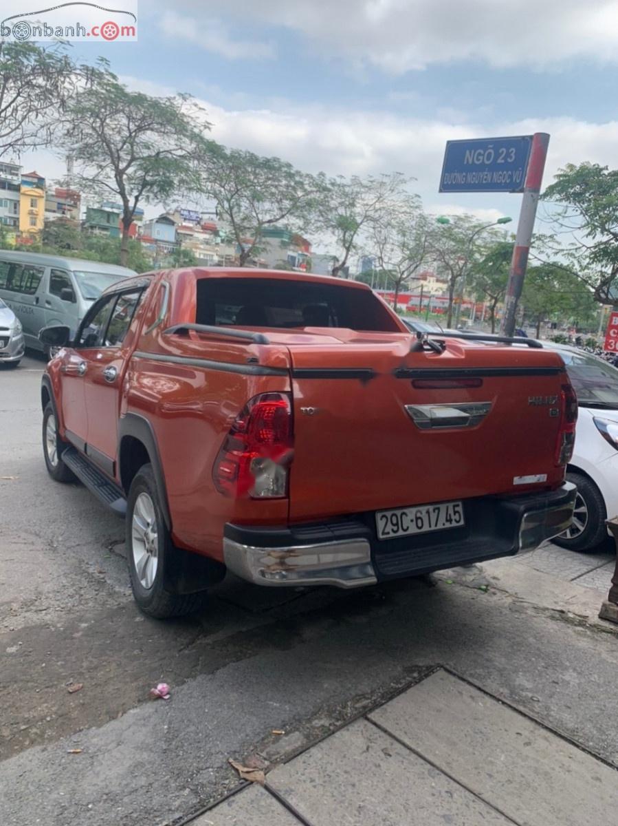 Toyota Hilux   2015 - Bán xe cũ Toyota Hilux 3.0G 4x4 AT năm 2015, màu đỏ, nhập khẩu