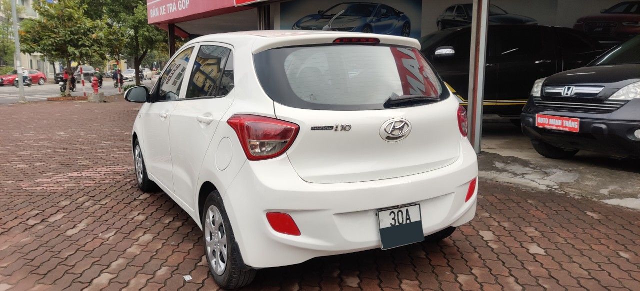 Hyundai Grand i10 1.0 MT 2014 - Bán xe Hyundai i10 1.0 MT đời 2014, màu trắng, nhập khẩu chính hãng