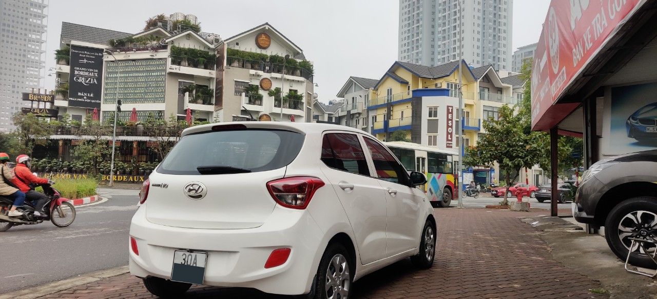 Hyundai Grand i10 1.0 MT 2014 - Bán xe Hyundai i10 1.0 MT đời 2014, màu trắng, nhập khẩu chính hãng