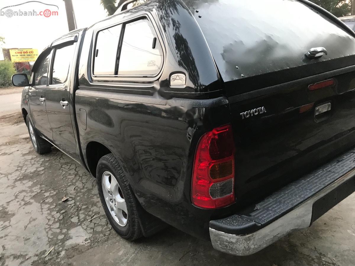 Toyota Hilux E 2009 - Bán Toyota Hilux E đời 2009, màu đen, xe nhập xe gia đình, 295tr