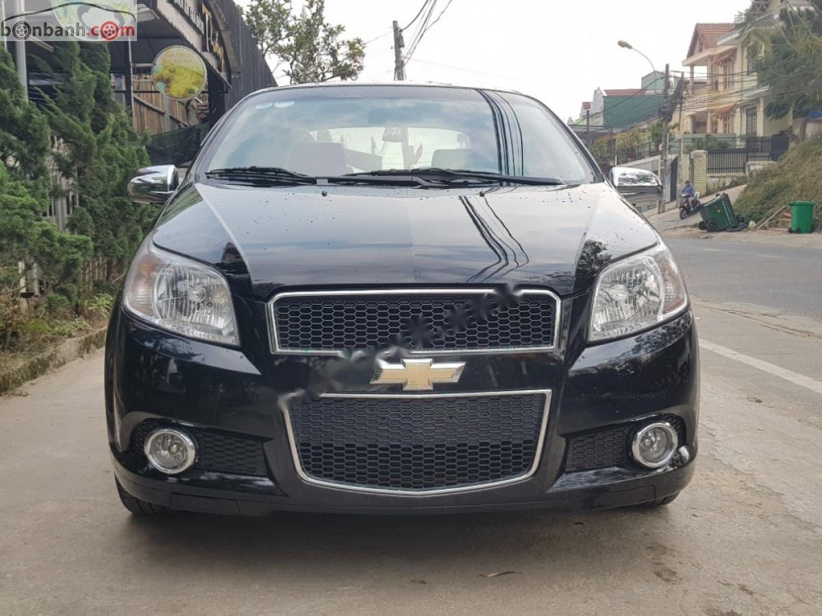 Chevrolet Aveo LTZ 2014 - Cần bán lại xe Chevrolet Aveo LTZ sản xuất năm 2014, màu đen còn mới, 285 triệu