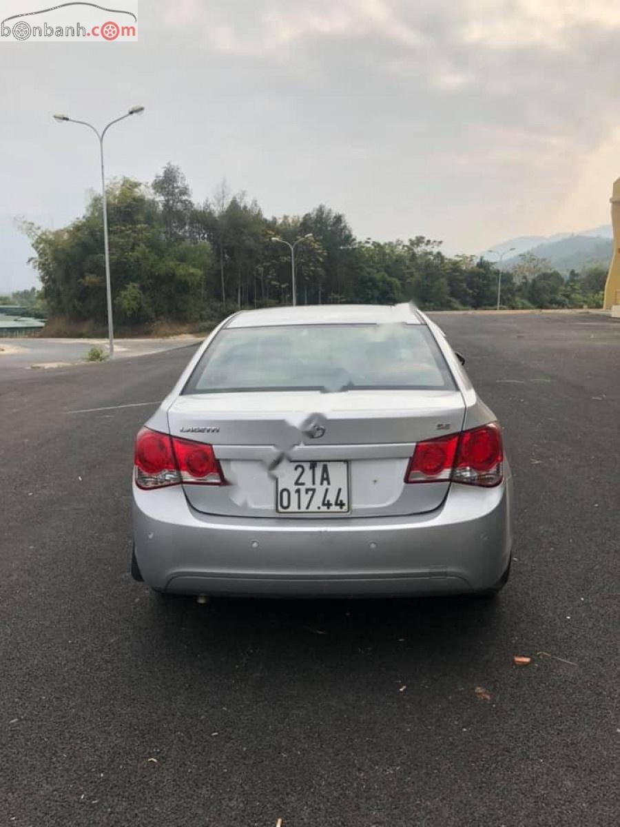 Daewoo Lacetti 2009 - Cần bán lại Daewoo Lacetti CDX 1.6 AT sản xuất 2009, màu bạc, xe nhập