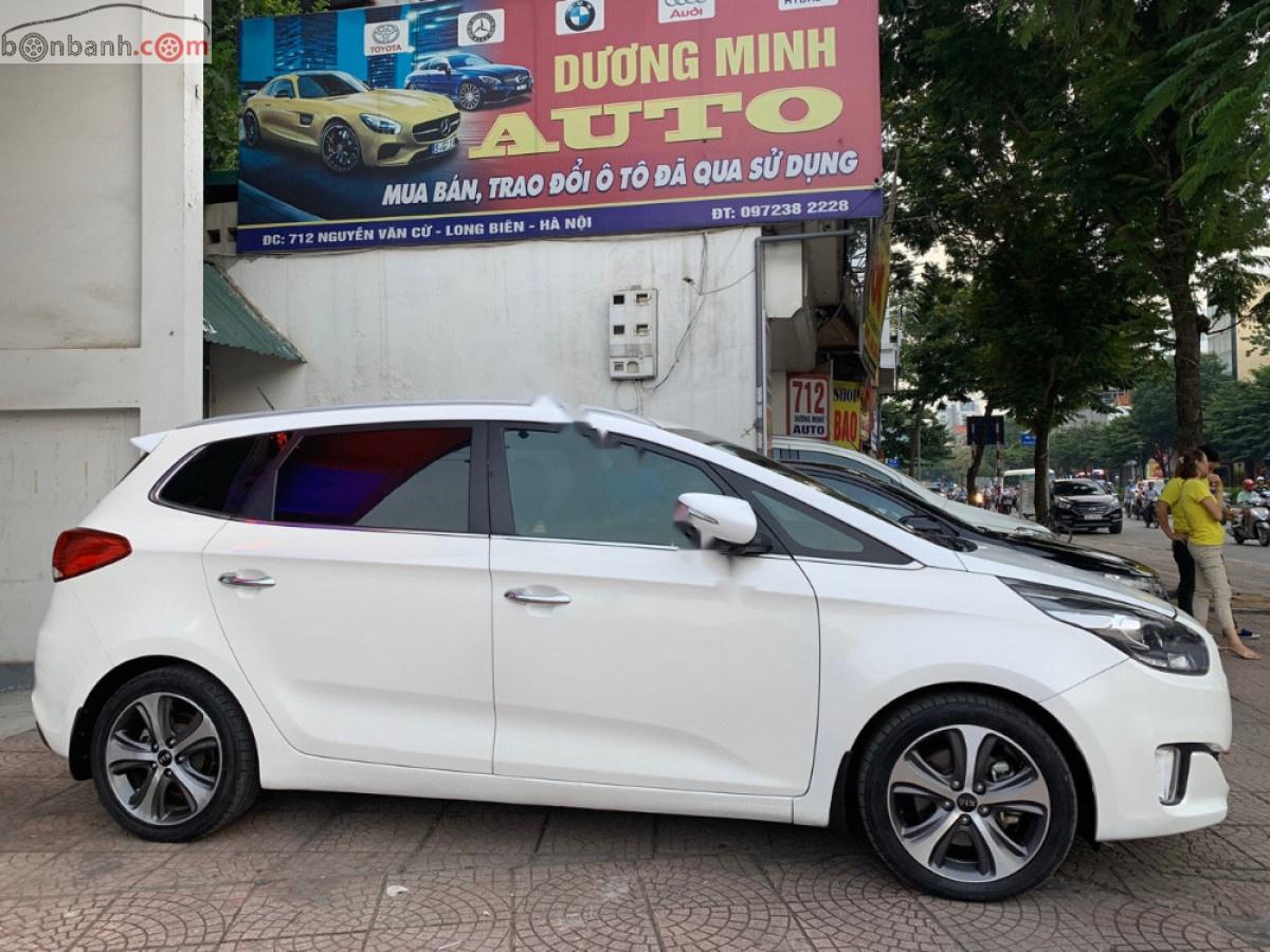 Kia Rondo DAT 2016 - Bán Kia Rondo DAT sản xuất 2016, màu trắng, nội thất da màu đen