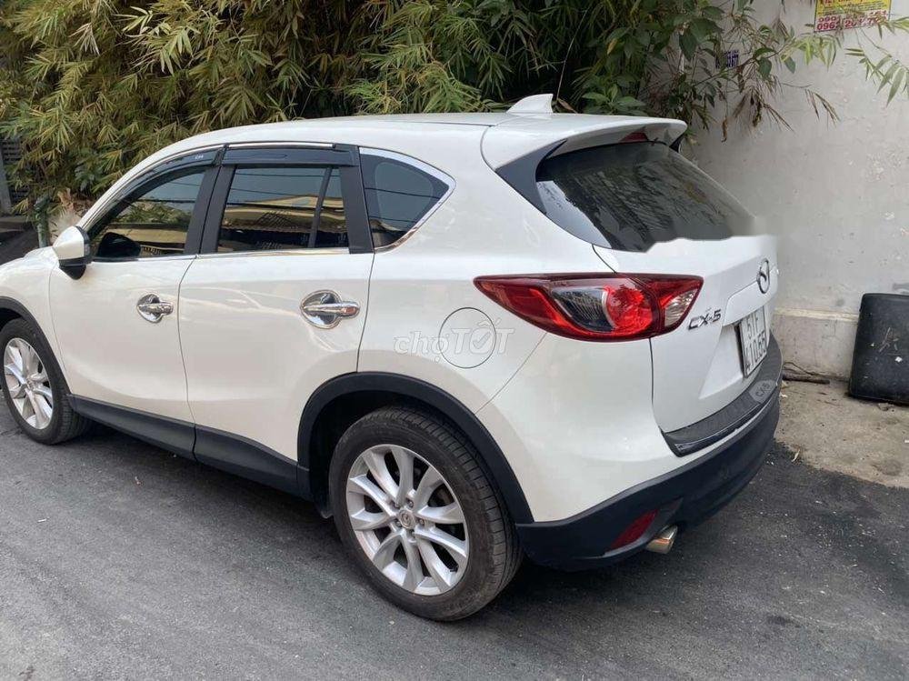 Mazda CX 5 2013 - Bán ô tô Mazda CX 5 sản xuất 2013, màu trắng, nhập khẩu nguyên chiếc, 615 triệu