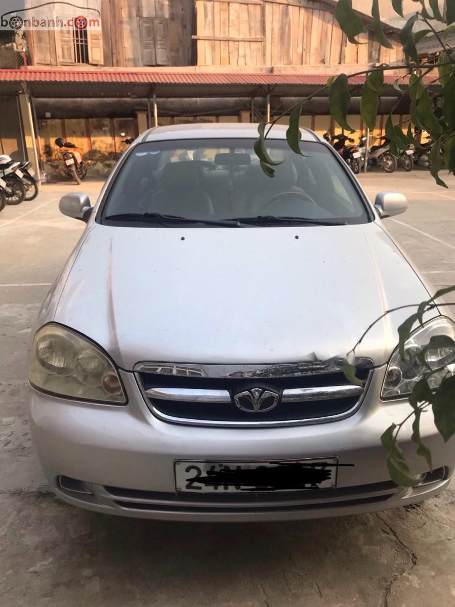 Daewoo Lacetti 2009 - Cần bán Daewoo Lacetti 1.6MT sản xuất năm 2009, màu bạc