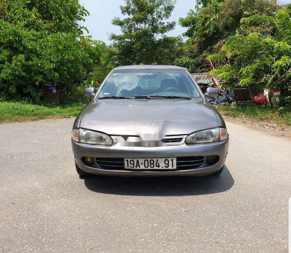 Proton Wira 1998 - Cần bán Proton Wira sản xuất 1998, màu xám, xe nhập, 54 triệu