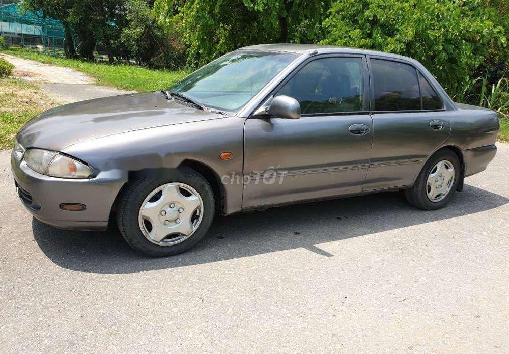 Proton Wira 1998 - Cần bán Proton Wira sản xuất 1998, màu xám, xe nhập, 54 triệu