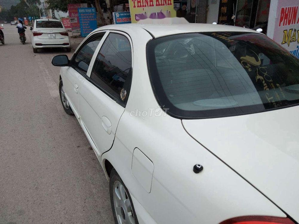 Kia Spectra   2004 - Bán xe Kia Spectra đời 2004, màu trắng, giá chỉ 86 triệu