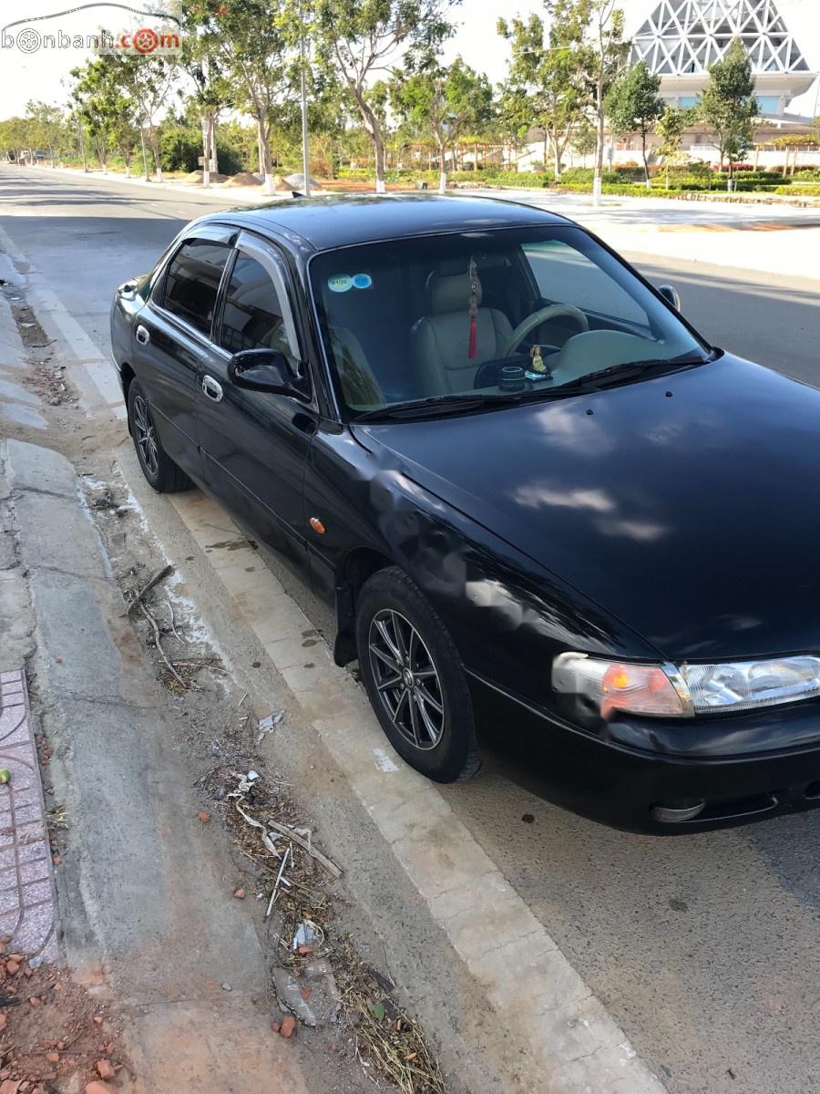 Mazda 626 1996 - Bán Mazda 626 năm sản xuất 1996, màu đen, nhập khẩu