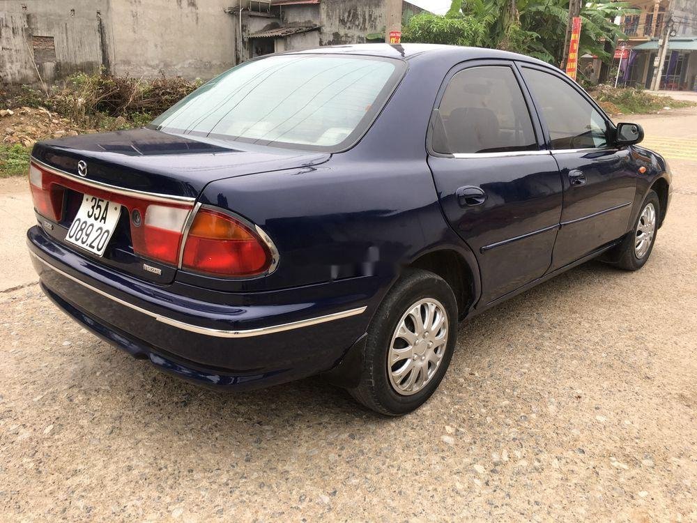 Mazda 323 2000 - Cần bán lại xe Mazda 323 đời 2000, màu xanh lam