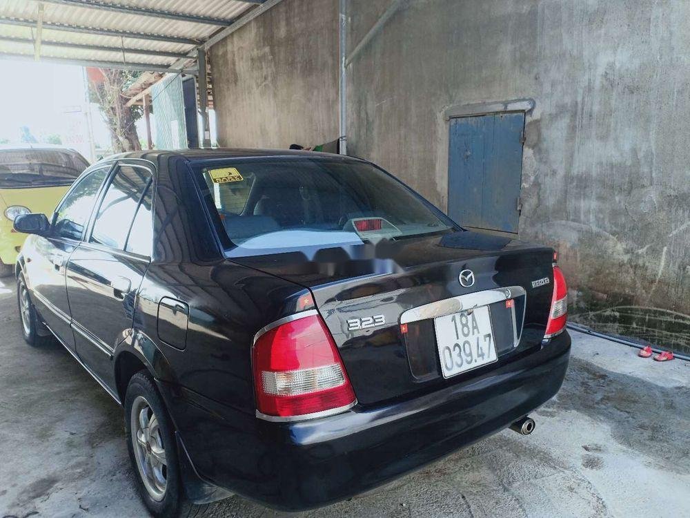 Mazda 323 2003 - Cần bán Mazda 323 sản xuất 2003, 136 triệu