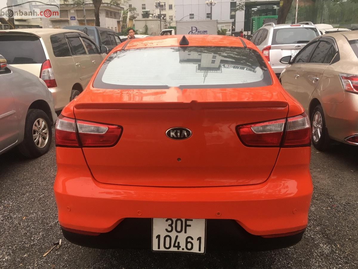 Kia Rio 1.4 AT 2014 - Bán xe Kia Rio 1.4 AT sản xuất 2014, màu vàng, nhập khẩu giá cạnh tranh