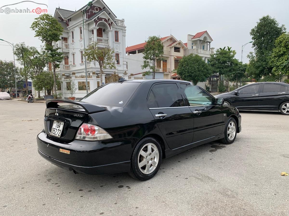 Mitsubishi Lancer 2.0 AT 2005 - Bán Mitsubishi Lancer 2.0 AT sản xuất 2005, màu đen, giá 195tr