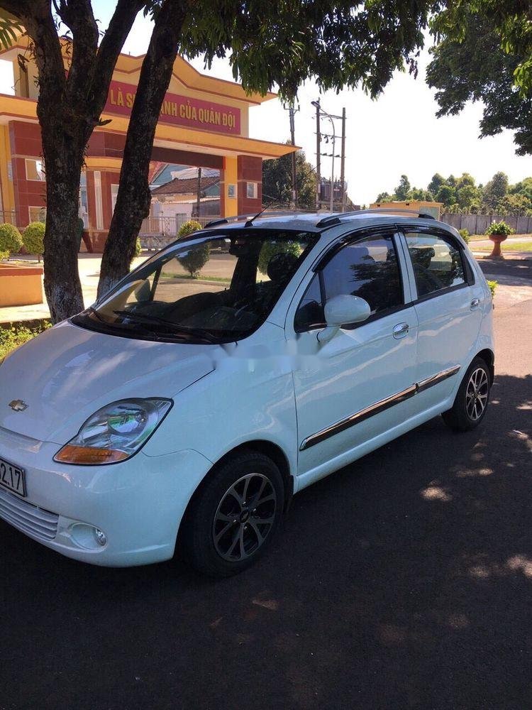 Chevrolet Spark   LT   2011 - Cần bán xe Chevrolet Spark LT sản xuất 2011, màu trắng, nhập khẩu còn mới