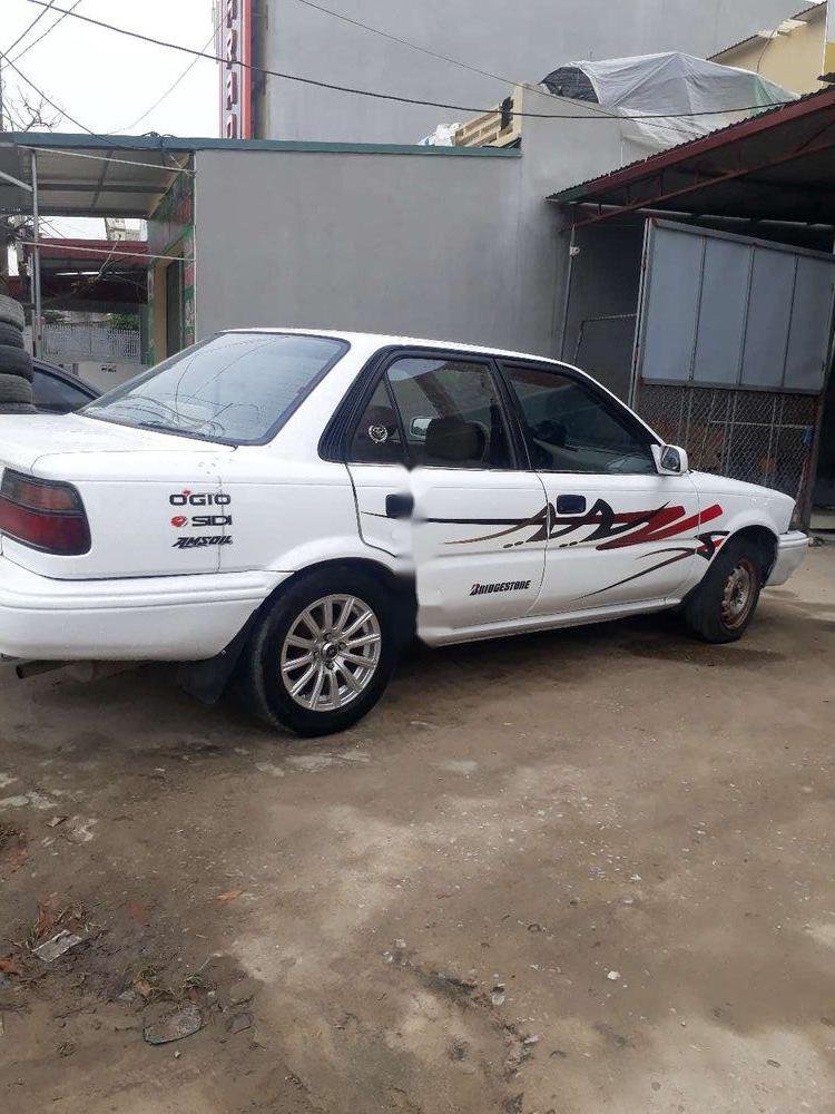 Toyota Corolla 1990 - Bán xe Toyota Corolla năm 1990, màu trắng, nhập khẩu nguyên chiếc