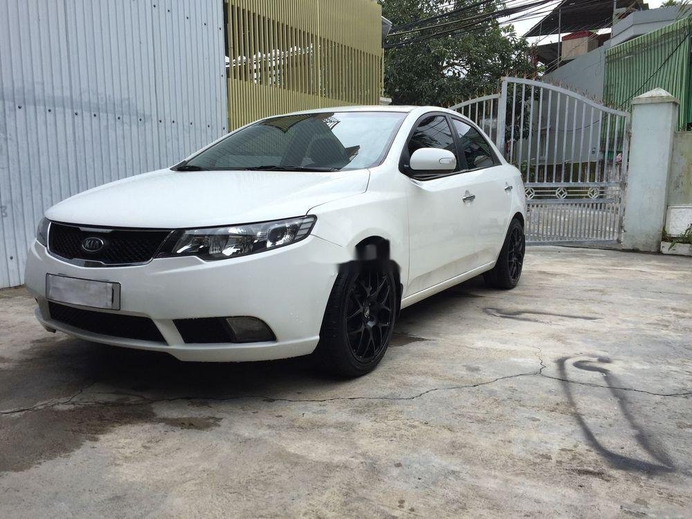 Kia Forte AT 2010 - Bán xe Kia Forte AT 2010, màu trắng số tự động