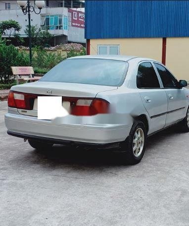 Mazda 323 1999 - Bán Mazda 323 đời 1999, màu trắng