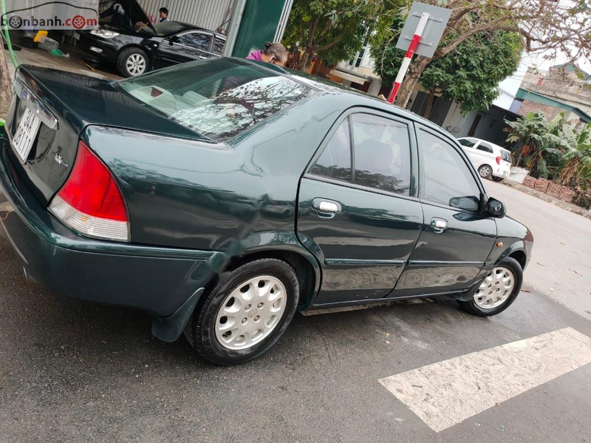 Ford Laser LX 1.6 MT 2001 - Gia đình cần bán gấp Ford Laser LX 1.6 MT đời 2001, màu xanh lam